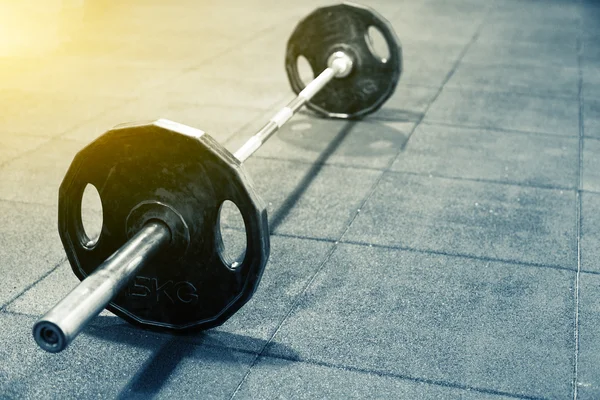 Barbell in modern gym — Stock Photo, Image