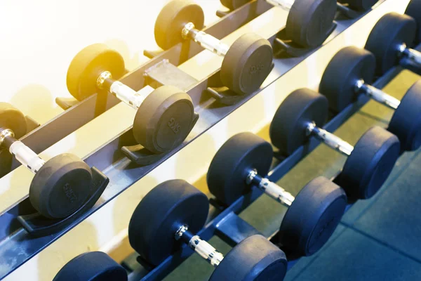 Dumbells in modern gym — Stock Photo, Image