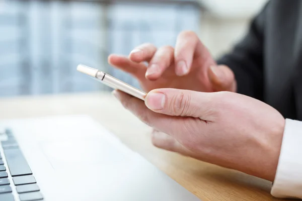 Business man checking financial report on table — стоковое фото