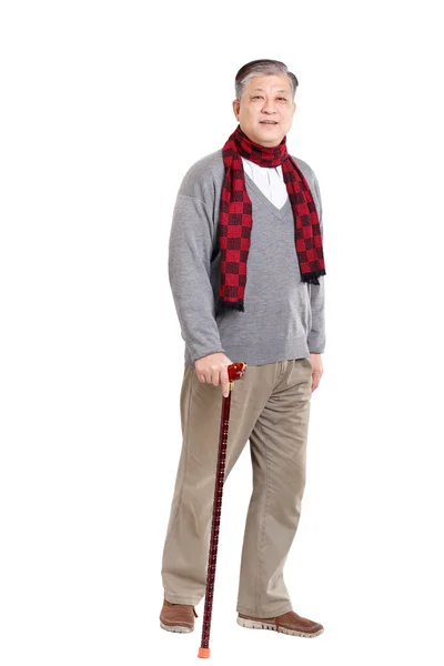 Aziatische oude man met wandelstok — Stockfoto