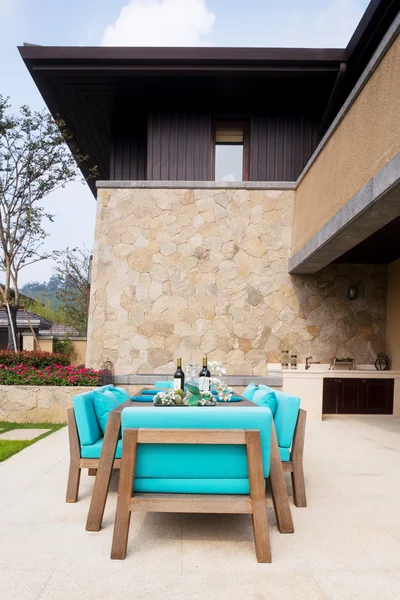elegant furniture in the patio outside building