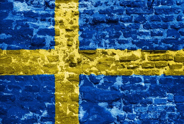 Swedish flag over old wall — Stock Photo, Image