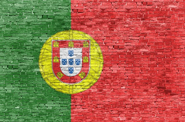 Portuguese flag over brick wall — Stock Photo, Image