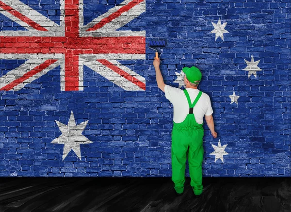 Australian flag painted over brick wall by house painter — Stock Photo, Image