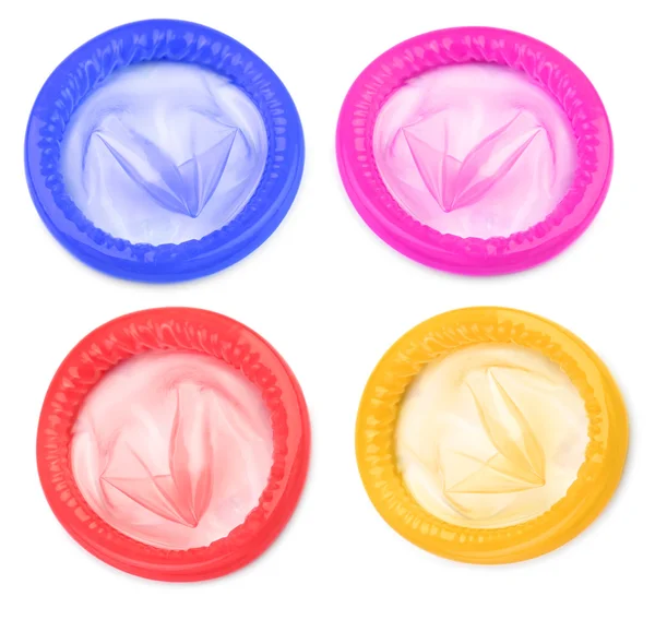 Cztery kolorowe prezerwatywy — Zdjęcie stockowe
