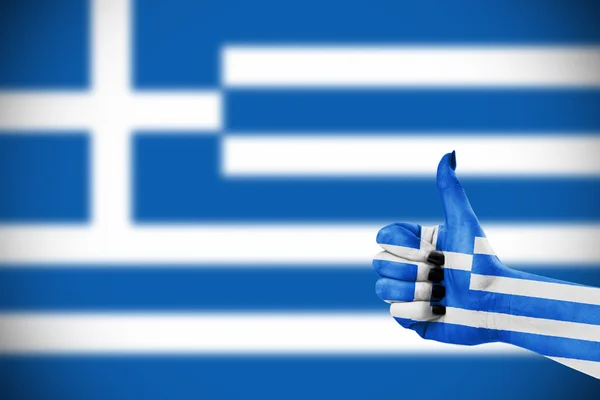 Bandera de Grecia a la mano —  Fotos de Stock