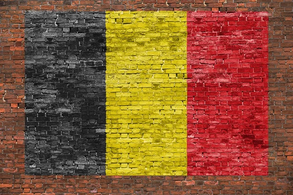 Vlag van België op leeftijd bakstenen muur — Stockfoto