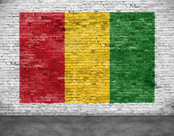 Bandera de reggae pintada en pared de ladrillo Imágenes De Stock Sin Royalties Gratis