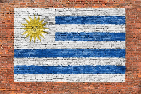 벽돌 벽에 그려 놓은 우루과이의 국기 — 스톡 사진