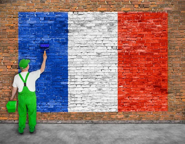 House painter paints flag of France — Stock Photo, Image