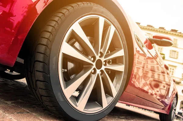 Red car in sunset — Stock Photo, Image