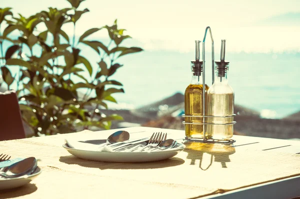 Vintage restaurant on the beach - Santorini — Stock Photo, Image