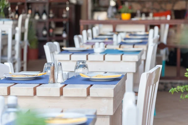 Restaurant in a Santorini village — Stock Photo, Image