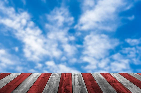 Empty wooden deck table with dusk sky background — ストック写真