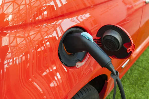 Electric car in charging station — Stock Photo, Image