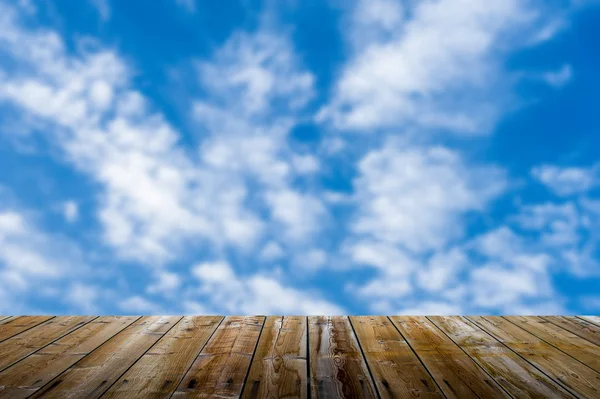 Empty wooden deck table with dusk sky background — Stock fotografie