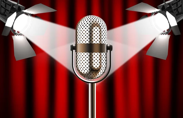 Mikrofon gegen roten Vorhang mit Scheinwerfern — Stockfoto