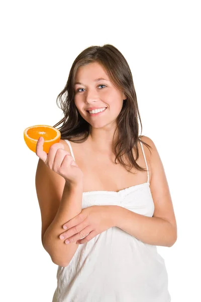 Linda Chica Riendo Sosteniendo Una Naranja Mano Aislada Frente Fondo — Foto de Stock