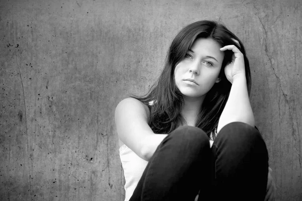 Teenage girl looking thoughtful about troubles — Stock Photo, Image