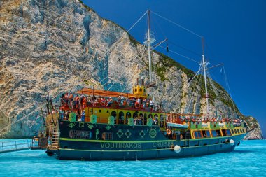 Tourist Cruise Boat in Navagio Bay, Zakyntos Island, Greece clipart