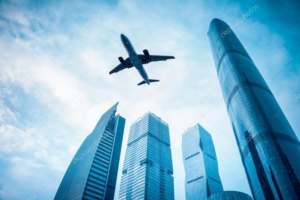 airplane with modern building