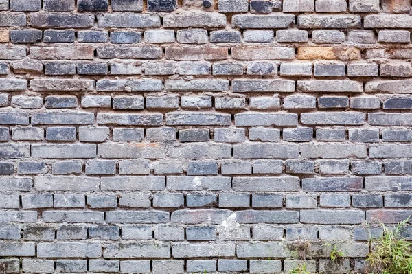 Ladrillo gris de la pared vieja —  Fotos de Stock