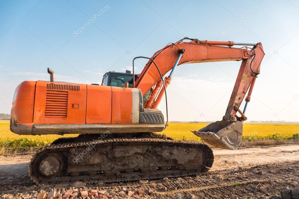 excavator on the country road