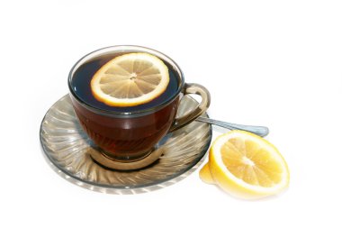 Bir fincan çay ve limon.