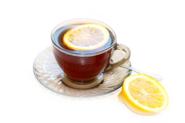 Bir fincan çay ve limon.