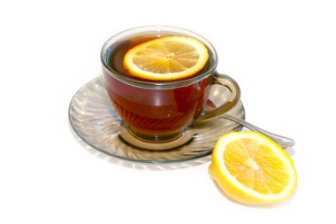 Bir fincan çay ve limon.