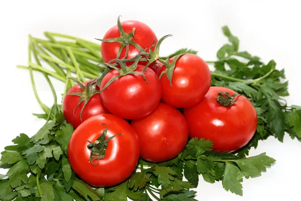Ripe tomatoes and a bunch of parsley — Stock Photo, Image