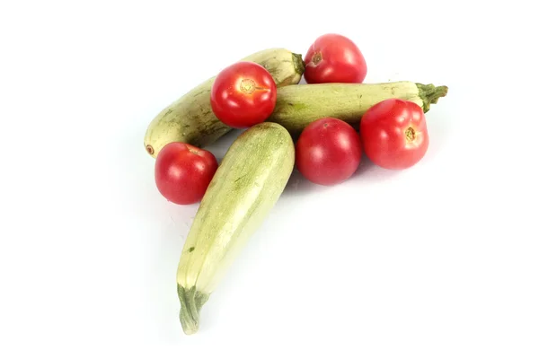 Tomatoes and zucchini — Stock Photo, Image