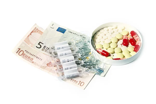 Geneeskunde voorbereidingen en euro — Stockfoto