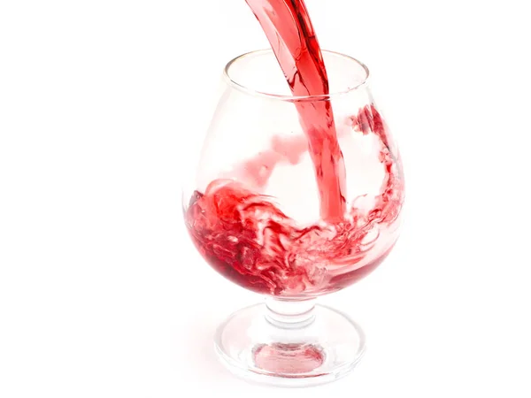 Droppar Och Stänk Rött Vin När Det Hälls Ett Glas — Stockfoto