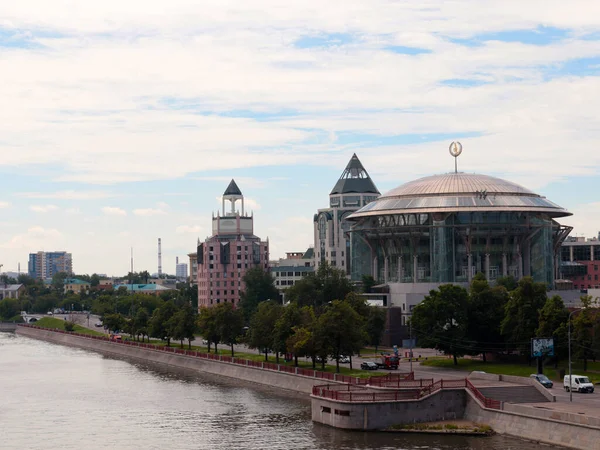 building House of Music on the river embankment Moscow Russia