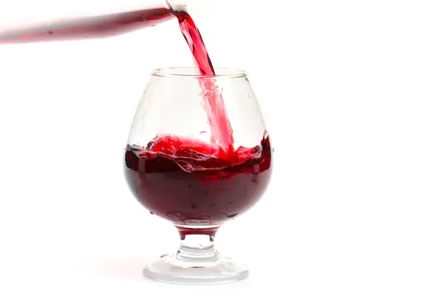 Ein Rotweinstrom Erzeugt Muster Wenn Ein Glas Gegossen Wird — Stockfoto