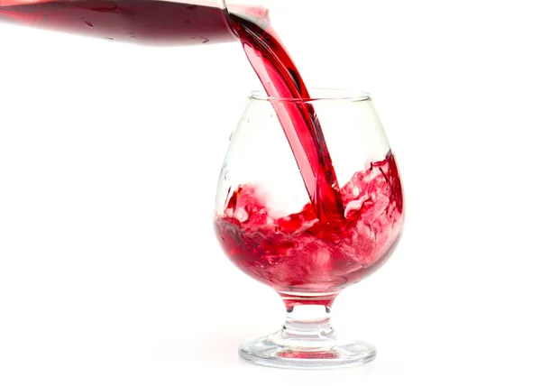 Ström Rött Vin Skapar Mönster När Hälls Ett Glas — Stockfoto