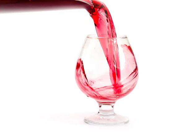 Ένα Ρεύμα Κόκκινου Κρασιού Όταν Χύνεται Ένα Ποτήρι — Φωτογραφία Αρχείου