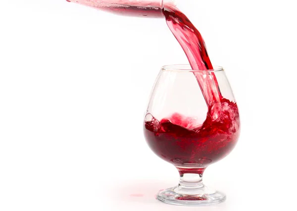 Red Wine Pours Glass Creating Whimsical Swirls — Stock Photo, Image