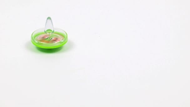 Children Toy Plastic Spinning Top Whirligig Spinning Symbol Balance — Stock Video
