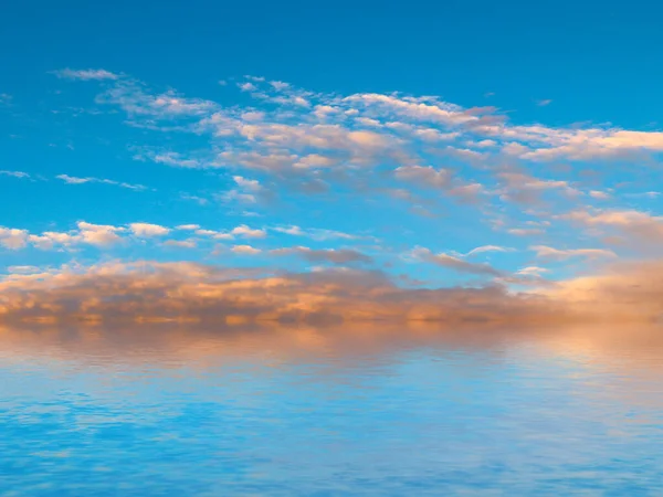 reflection of the blue cloudy sky in the calm surface of the sea space