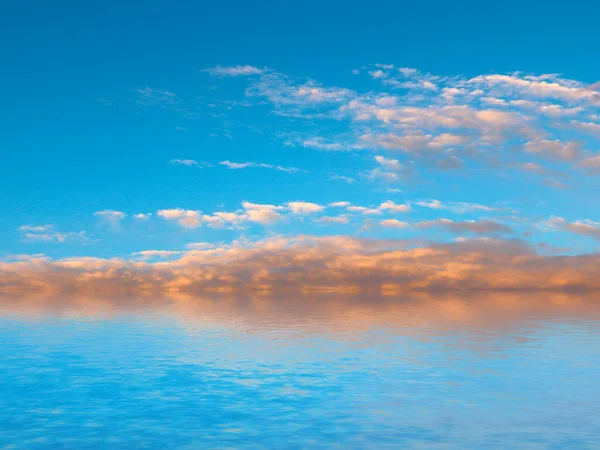 reflection of the blue cloudy sky in the calm surface of the sea space