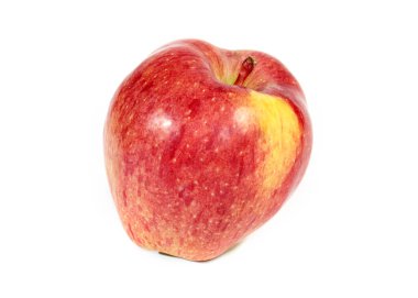 Hasatın bir parçası olarak olgun kırmızı bir elma.