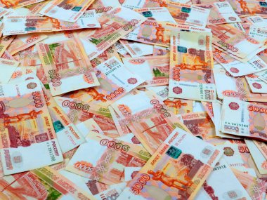 Ülkenin ticaret ekonomisinin bir unsuru olarak Rus rublesi beş bininci kağıt yığını.