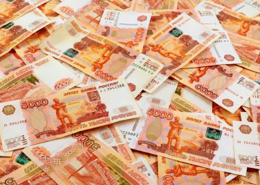 Ülkenin ticaret ekonomisinin bir unsuru olarak Rus rublesi beş bininci kağıt yığını.