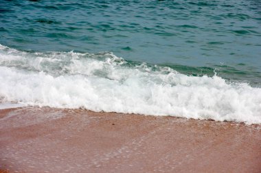 Sörf ve kumsal ideal bir tatil yeri.