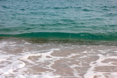 Sörf ve kumsal ideal bir tatil yeri.