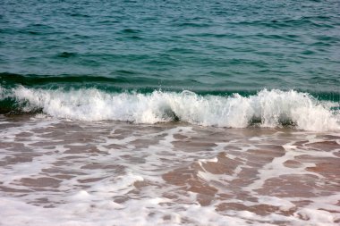 Sörf ve kumsal ideal bir tatil yeri.