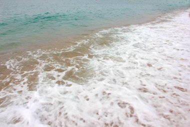 beautiful sandy beach and sea waves