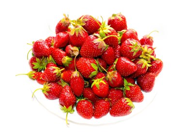 lovely ripe garden strawberry as part of a summer treat at harvest time